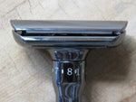 Adjustable safety razor. DE20